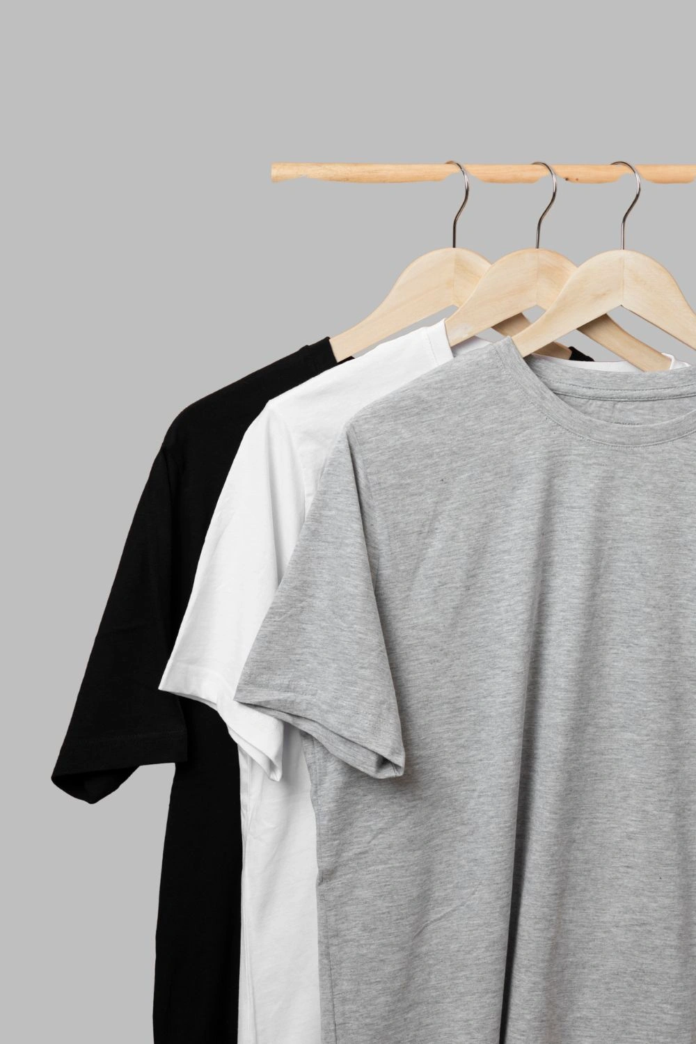 Front view of Oversized Everyday Essentials Combo – 3 Plain T-Shirts (Black, White, Grey)